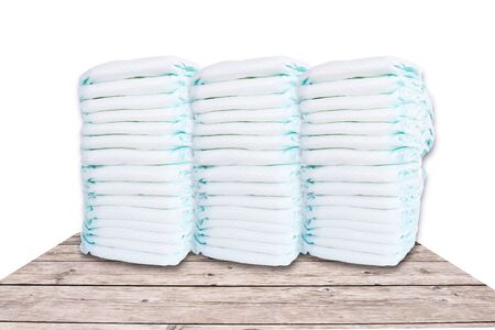 Stack of diapers isolated on white backgroundの写真素材