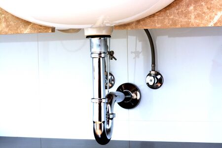 Basin siphon or sink drain in a bathroomの写真素材