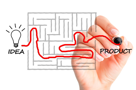 Bringing a product from concept to reality concept suggested by finding a path in a mazeの写真素材