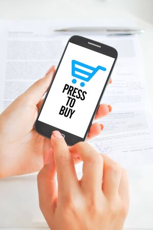 Buy online with mobile phoneの写真素材