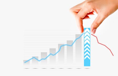 Human hand pulling graph bar suggesting increase of sales or businessの写真素材