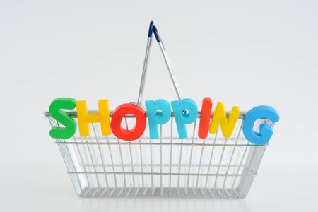 Metal Shopping basket with magnetic letters on itの写真素材