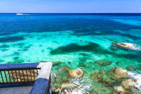 Couple snorkelling in crystal clear sea, Koh Tao, Samui, Thailandの写真素材