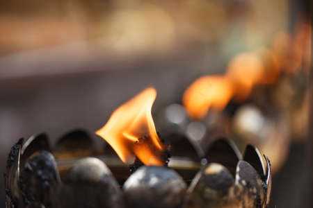 Thai style metal candle in Thai temple, Chiang Mai, Thailandの写真素材