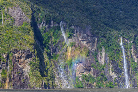 A small waterfall at Milford Sound, New Zealandの写真素材