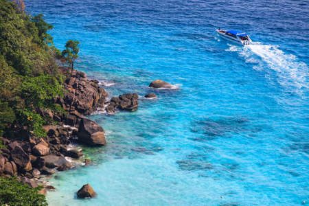 Aerial view of a tourist speed boat in tropical sea, Similan island, Thailandの写真素材