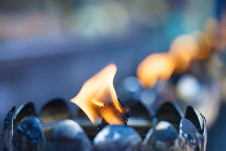 Thai style metal candle in Thai temple, Chiang Mai, Thailandの写真素材