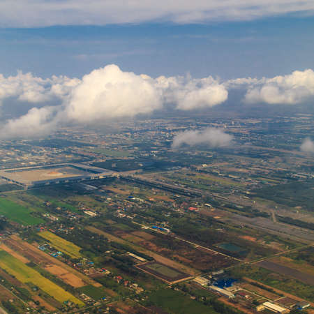 Aerial view of clouds and village landscape, Thailandの写真素材