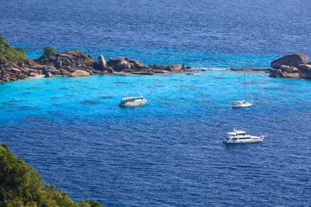 Aerial view of a tourist speed boat in tropical sea, Similan island, Thailandの写真素材