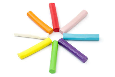 Colorful rod plasticine arranging on isolate white backgroundの写真素材
