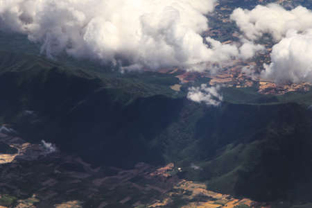 Aerial view of clouds and village landscape, Thailandの写真素材