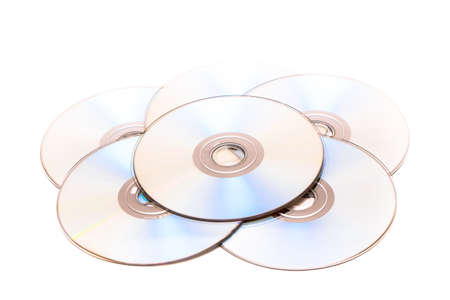 Stack of CD and DVD disc on isolated white backgroundの写真素材