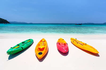 Colorful kayak on tropical island beach, Ranong, Thailandの写真素材