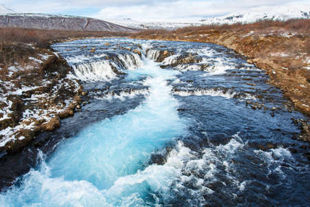 Blue water fall along river,Bruarfoss waterfall, Icelandの写真素材
