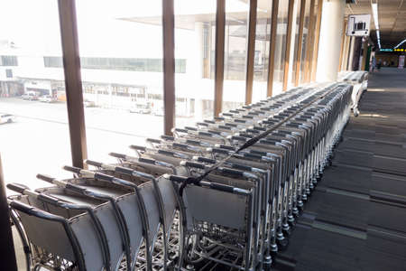 Bangkok, Thailand April  15, 2020 : airport trolley arrange in a terminal hall waiting for passenger come to use themのeditorial素材
