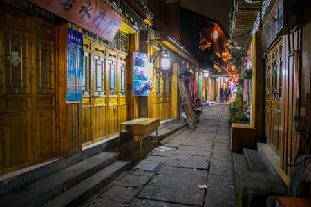 Changsha,China Feb 20, 2014 old traditional chinese town small street with closing doorsのeditorial素材