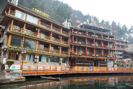 Changsha, China - Feb 21,2014 : beautiful scenery early morning view of Fenghuang village, a traditional houses along the river in Hunan,Chinaのeditorial素材