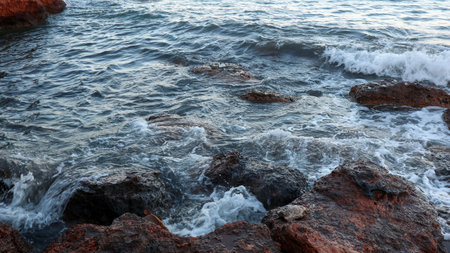 Waves breaking on the rocks in the sea. Natural background.の写真素材