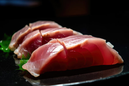 macro shot of a tuna sashimi slice with wasabi and soy sauce on the side, AI Generatedの素材