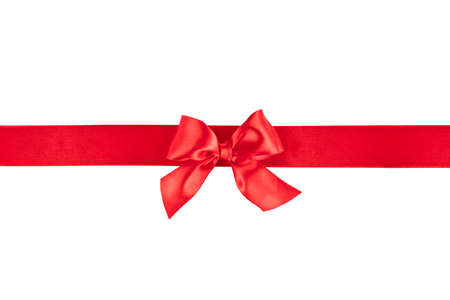 red festive ribbon with bow isolatedの写真素材