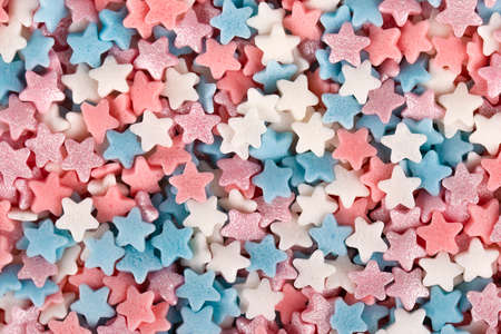 background colored pastry sprinkling starsの写真素材