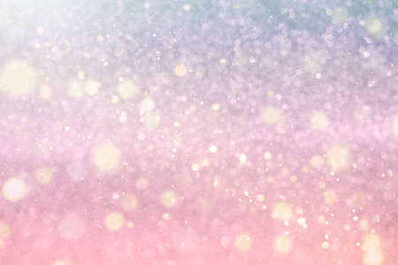 christmas background blue and pink with defocus light and bokehの写真素材