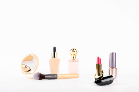 on a gray background cosmetics in a red caseの写真素材