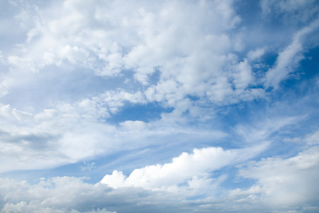 blue sky background with white cloudsの写真素材