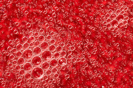 water drops macro on a red backgroundの写真素材