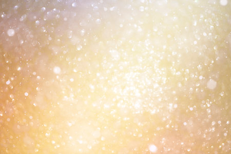 gold background defocus light and bokehの写真素材