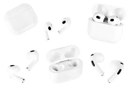 set of white wireless headphones isolatedの写真素材