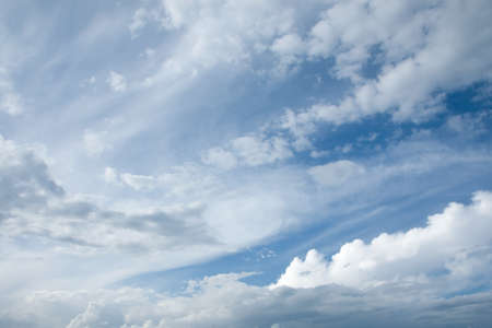 blue sky background with white cloudsの写真素材