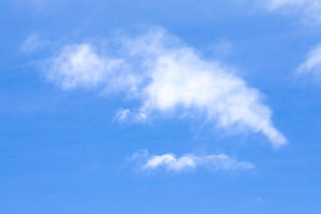 blue sky background with white cloudsの写真素材