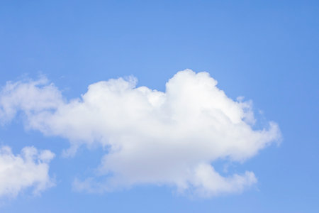 blue sky background with white cloudsの写真素材
