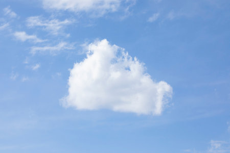 blue sky background with white cloudsの写真素材