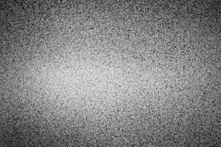 background gray concrete wall with small spotsの写真素材
