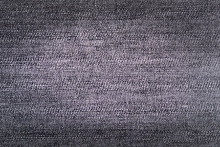 Background: Grey denim texture close up.の写真素材