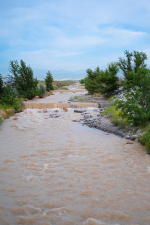 Landscape of the river against the background of mountains and blue sky.の写真素材