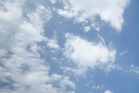 Blue sky background with white clouds.の写真素材