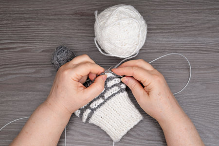 female hands knitting close up.の写真素材