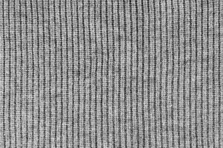 Wool knitwear Gray background Close-up.の写真素材