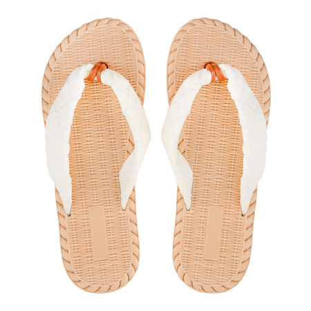 white with beige women's summer flip flops isolated on white background.の写真素材