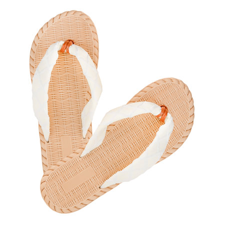 white with beige women's summer flip flops isolated on white background.の写真素材