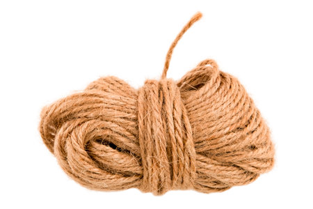 Brown rope twine isolated on white background.の写真素材