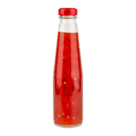 Glass bottle of chili sauce isolated on white background.の写真素材