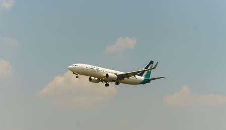 Kuala Lumpur, Malaysia, 15th March 2016, Silk Air  aircraft on landing approach at the airportのeditorial素材