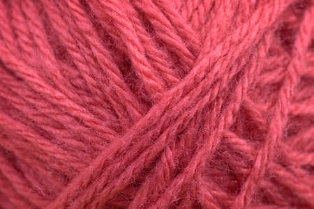 background of pink yarn closeupの写真素材