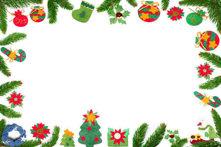 Christmas border made with paper ornaments and fir tree の写真素材