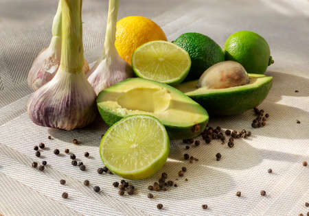 Pasta from Avocado. Avocado lime, lemon, garlic and peppercorns. Natural light. Green, yellow colors.の写真素材