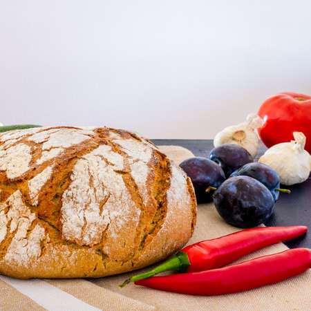 Polish bread on a country table. Plum taste of summer. Europe, Poland, Mazovia.の写真素材